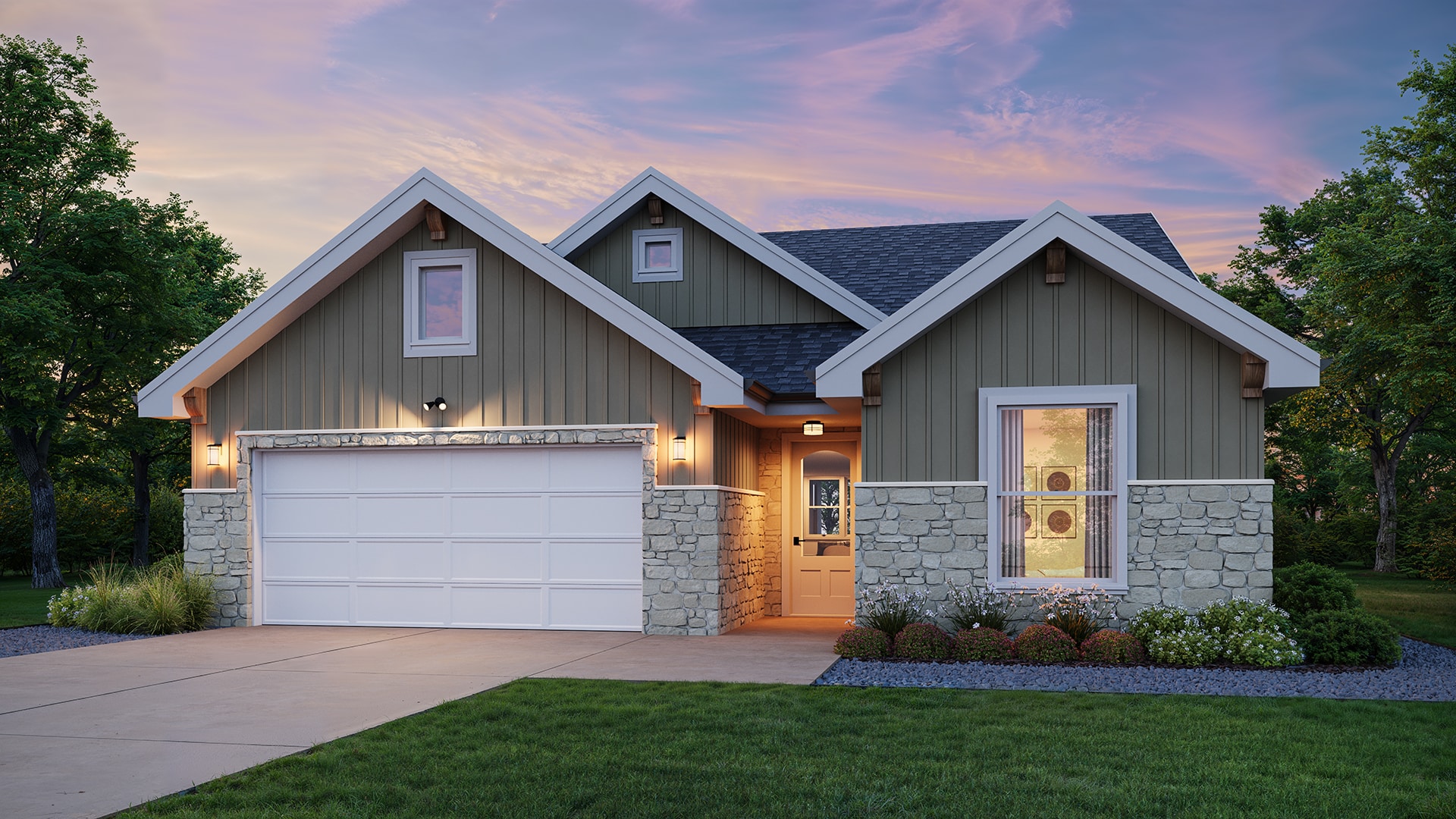 Single-story suburban house with gabled roof, stone and vertical siding, lit entryway, two-car garage, front lawn and planted flowerbeds at dusk.