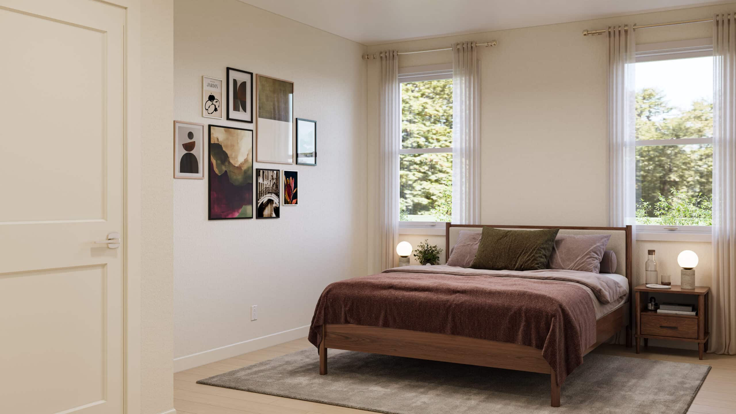 Bedroom with a wooden bed, mauve bedding, framed artwork, bedside tables, and windows overlooking trees