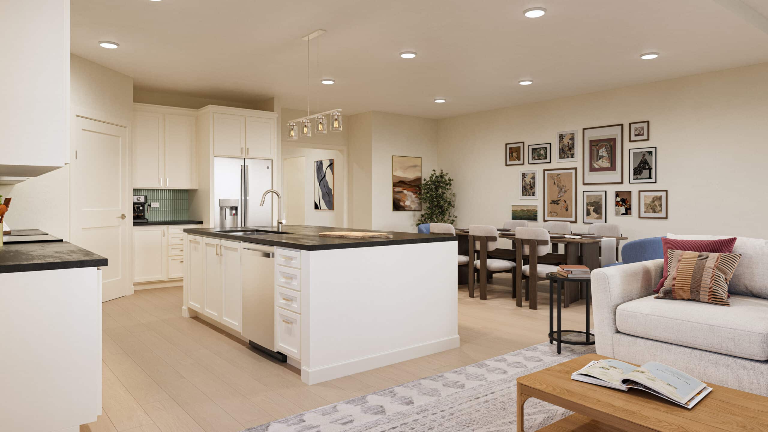 Open-plan kitchen, dining, and living area with white cabinetry, a central island, framed wall art, dining table, and sofa