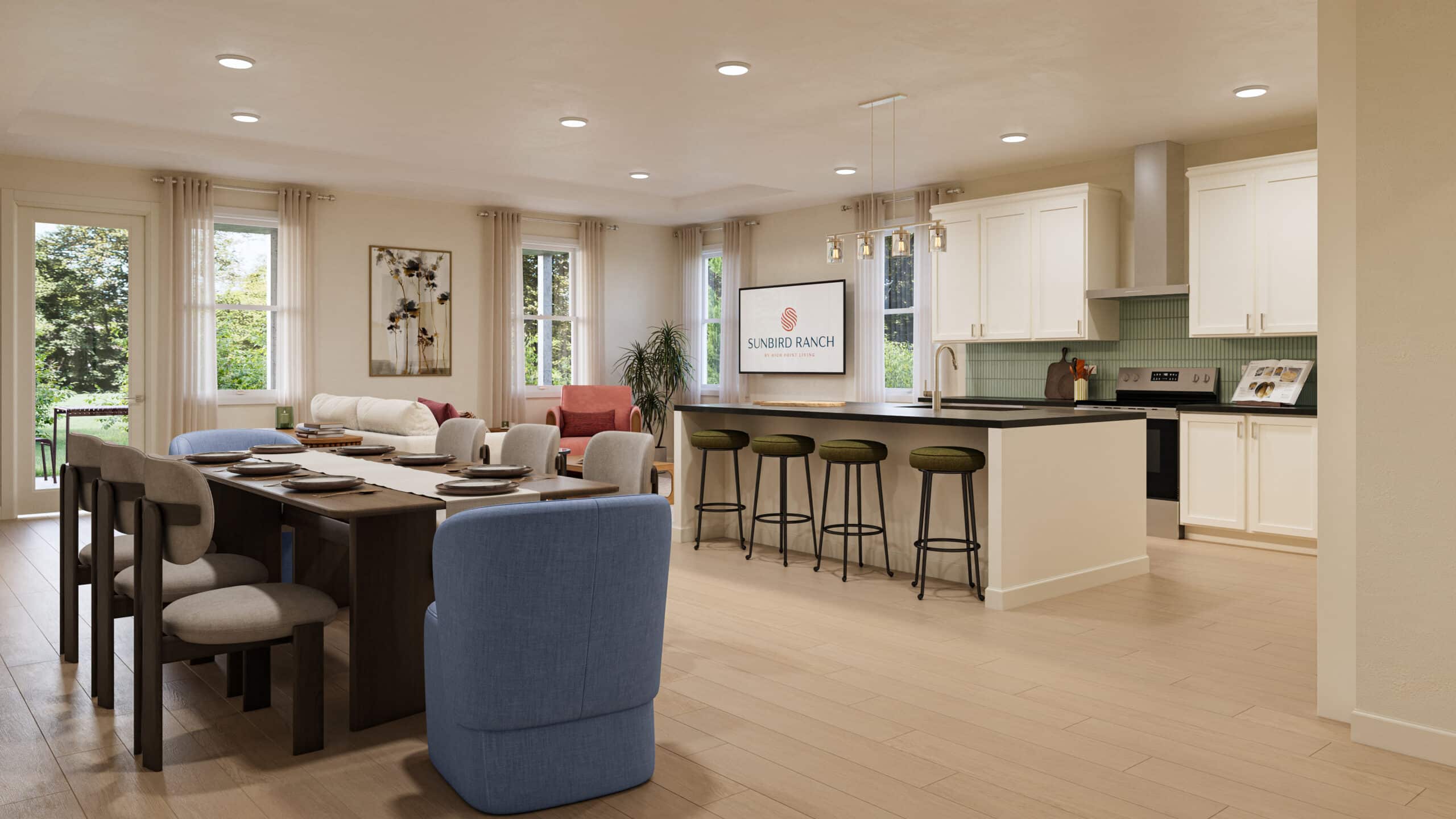 Open-plan dining and living area with a bright kitchen island, bar stools, white cabinetry, and large windows
