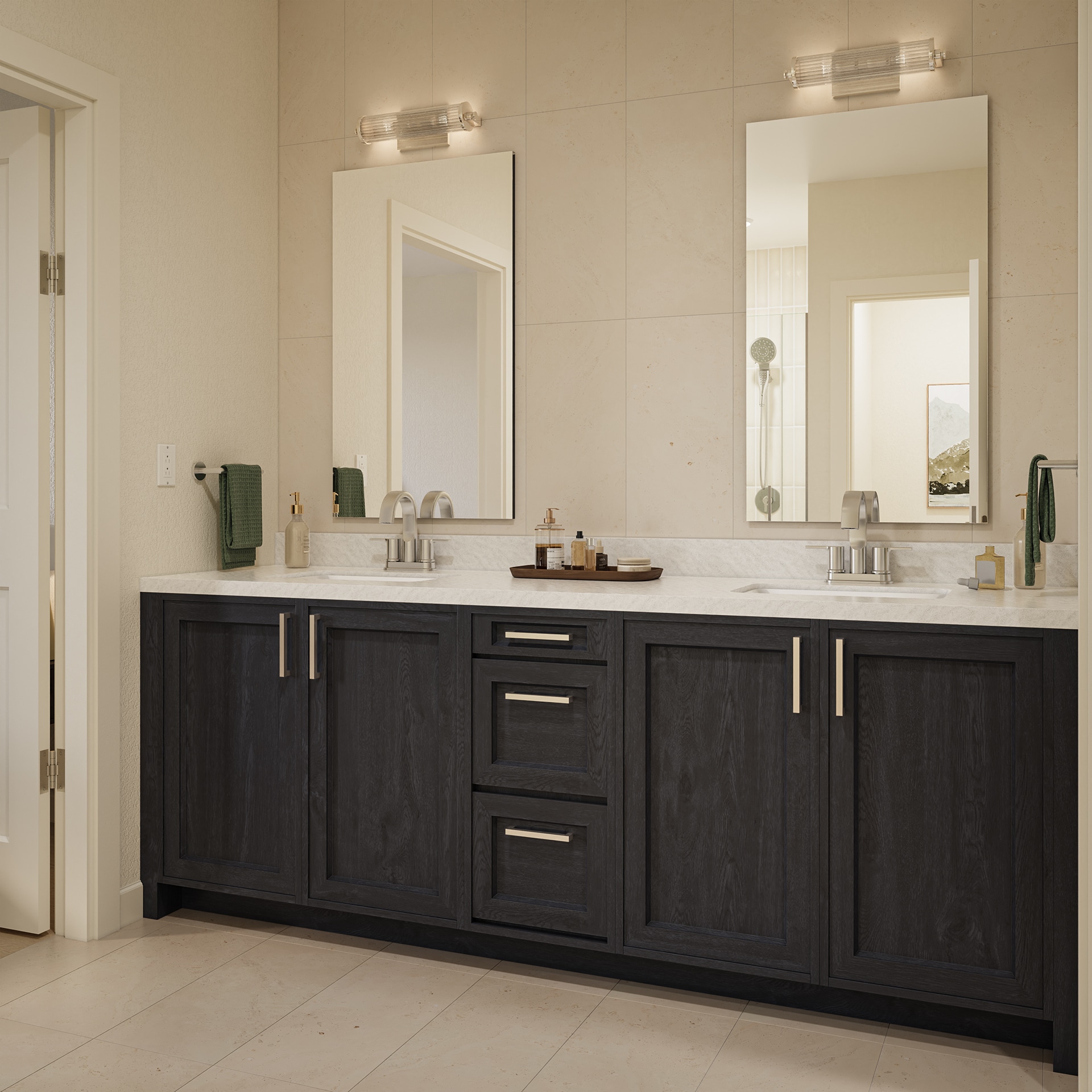 Bathroom vanity with dark wood cabinets, double sinks, large mirrors, wall lights, and green towels